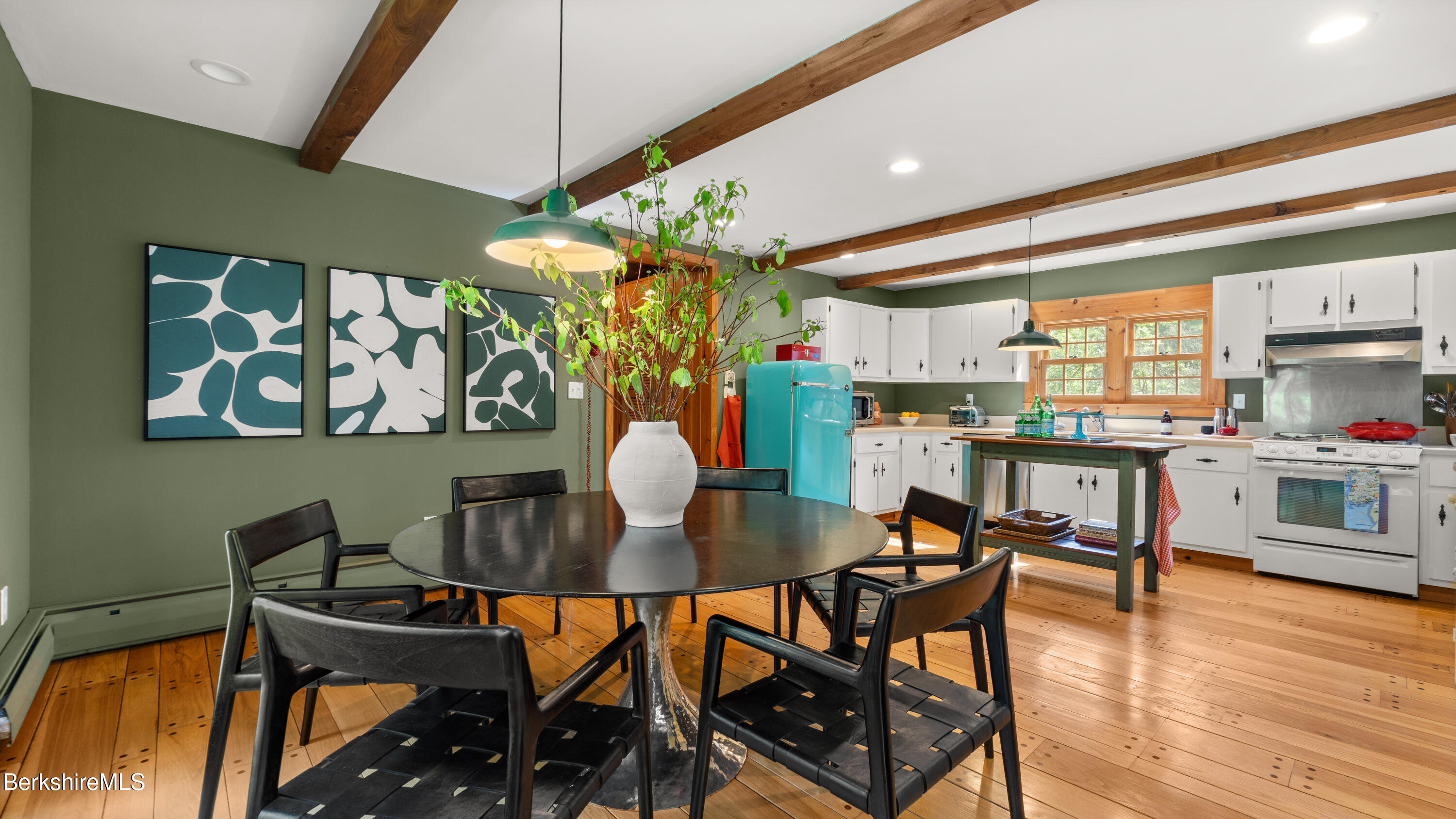 137 E Road Alford, MA 01266 - Photo 16 of 32 a dining room filled chandelier and wooden floor