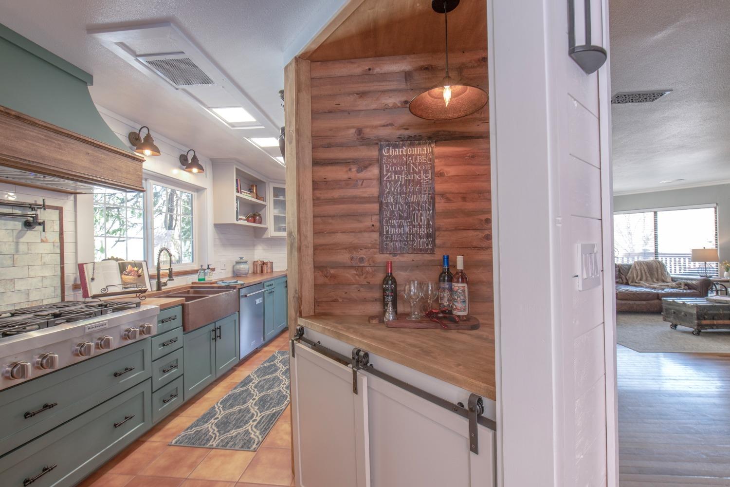 33952 Tocaloma Road Auberry, CA 93602 - Photo 14 of 48 a kitchen with a sink and cabinets