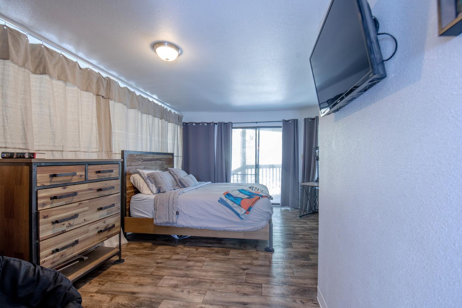 33952 Tocaloma Road Auberry, CA 93602 - Photo 39 of 48 a room with a bed and a window