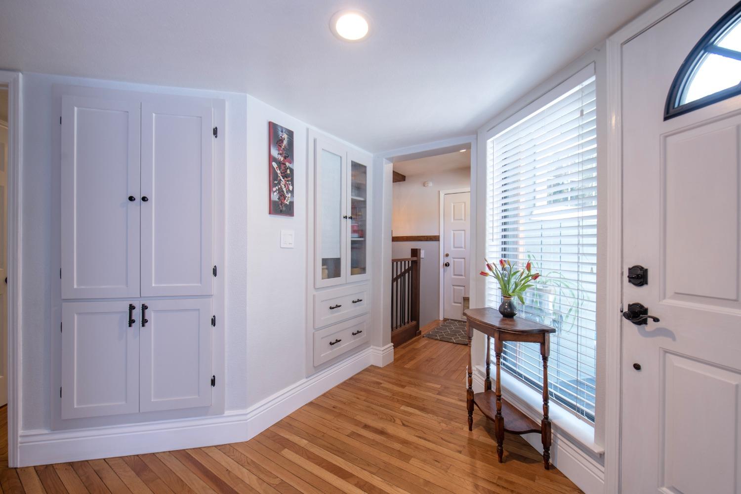 33952 Tocaloma Road Auberry, CA 93602 - Photo 6 of 48 a view of a workspace with furniture and windows