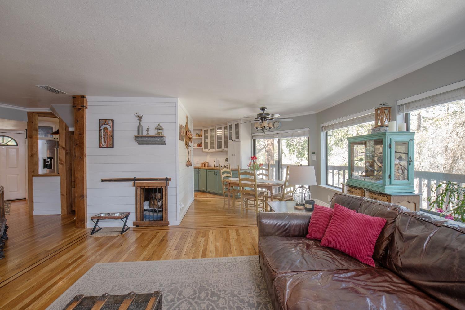 33952 Tocaloma Road Auberry, CA 93602 - Photo 9 of 48 a living room with furniture and a fireplace