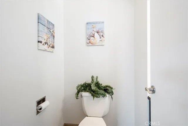 a vase with flowers on a table