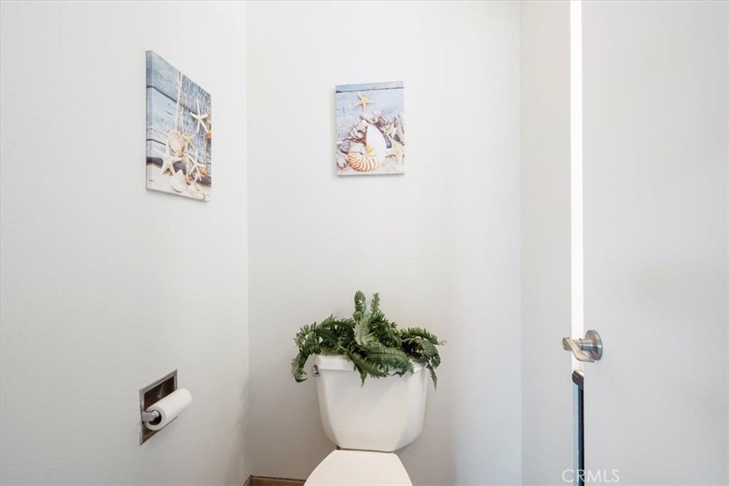 96 24th Street Cayucos, CA 93430 - Photo 27 of 49 a vase with flowers on a table