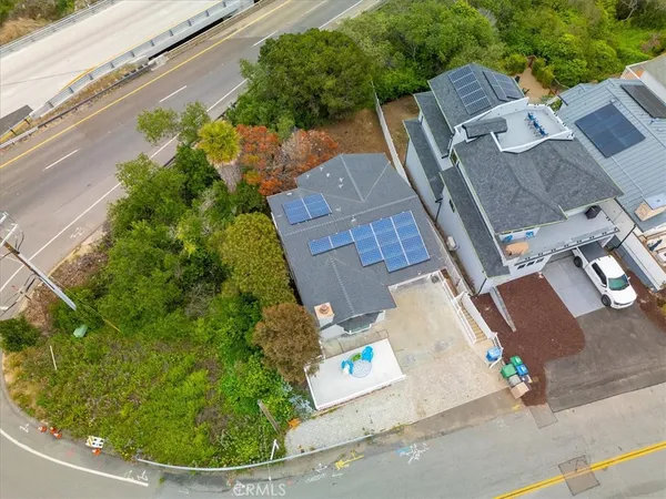 an aerial view of residential house with outdoor space