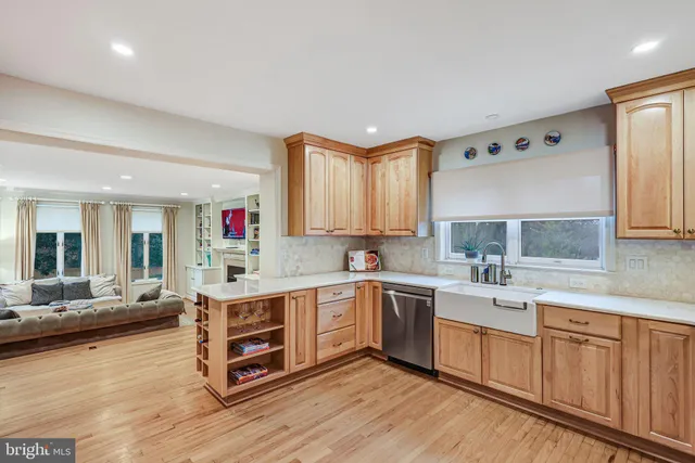 a living room with furniture fireplace and flat screen tv
