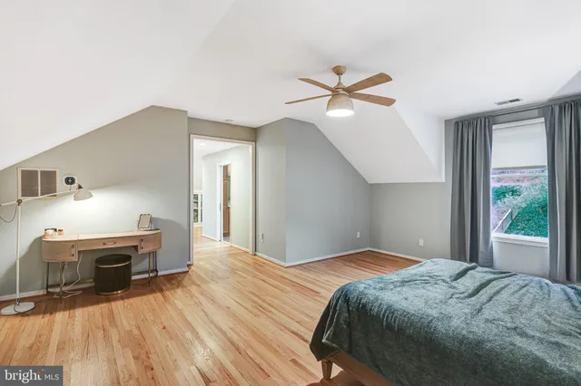 a bathroom with a sink a toilet and bathtub