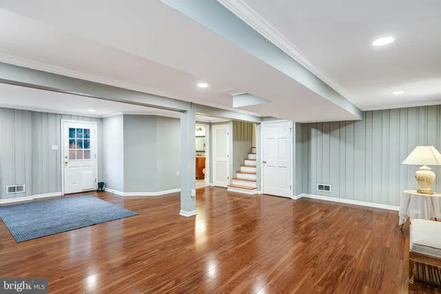 a view of entryway with wooden floor