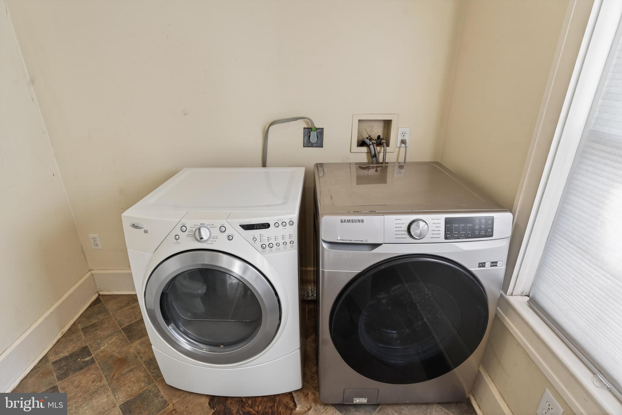 3202 Old Ocean City Road Salisbury, MD 21804 - Photo 13 of 29 a close view of a utility room with dryer and washer