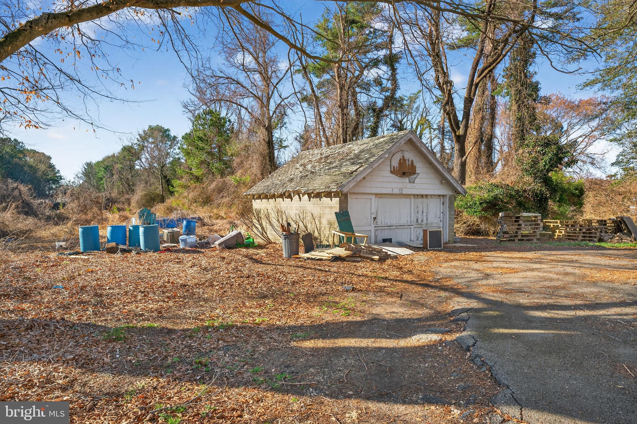 3202 Old Ocean City Road Salisbury, MD 21804 - Photo 29 of 29 a front view of a house with a yard