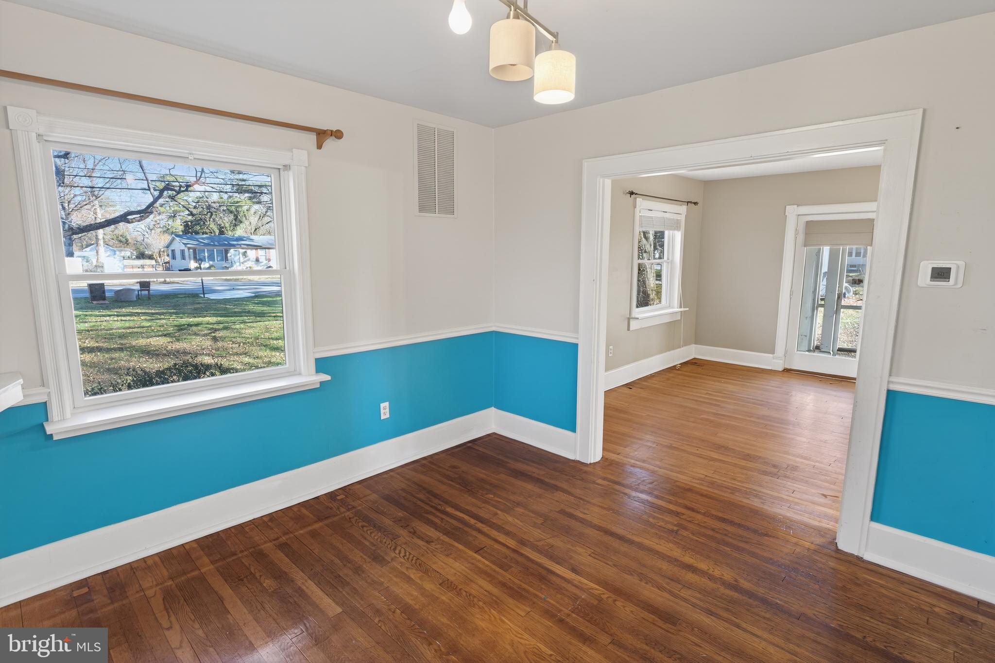 3202 Old Ocean City Road Salisbury, MD 21804 - Photo 7 of 29 a view of a room with wooden floor and windows