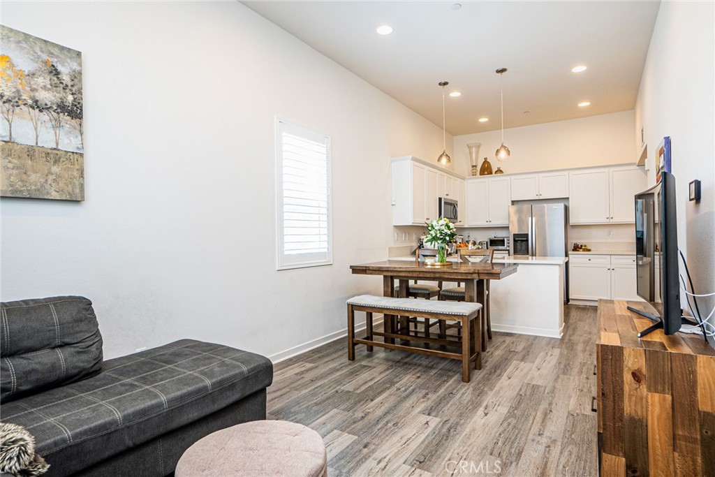 4956 Arrow, Unit B Montclair, CA 91763 - Photo 7 of 35 a living room with furniture and a wooden floor