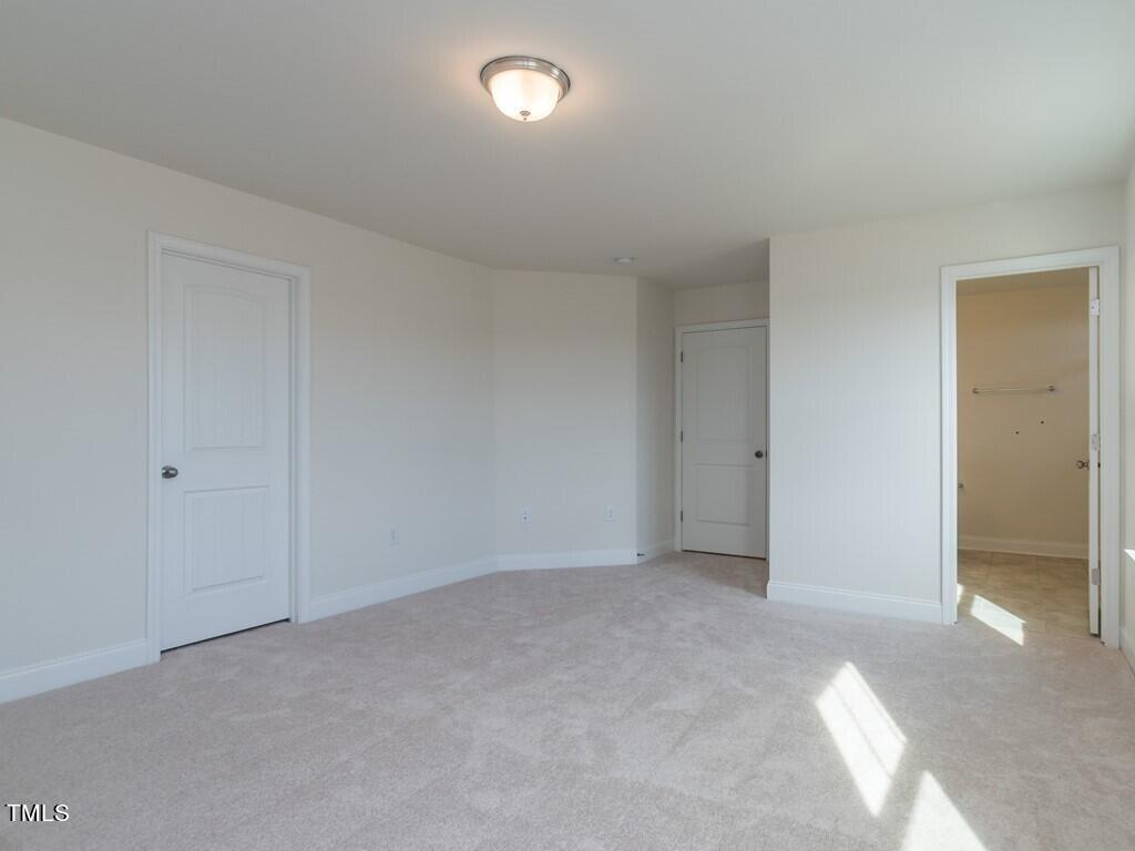 937 Channel Drop Loop Zebulon, NC 27597 - Photo 15 of 22 015_ Master Bedroom