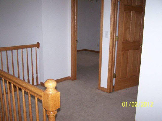 8550 South Rood Road Kingston, IL 60145 - Photo 6 of 9 a view of a hallway