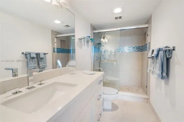 a view of livingroom with washer and dryer