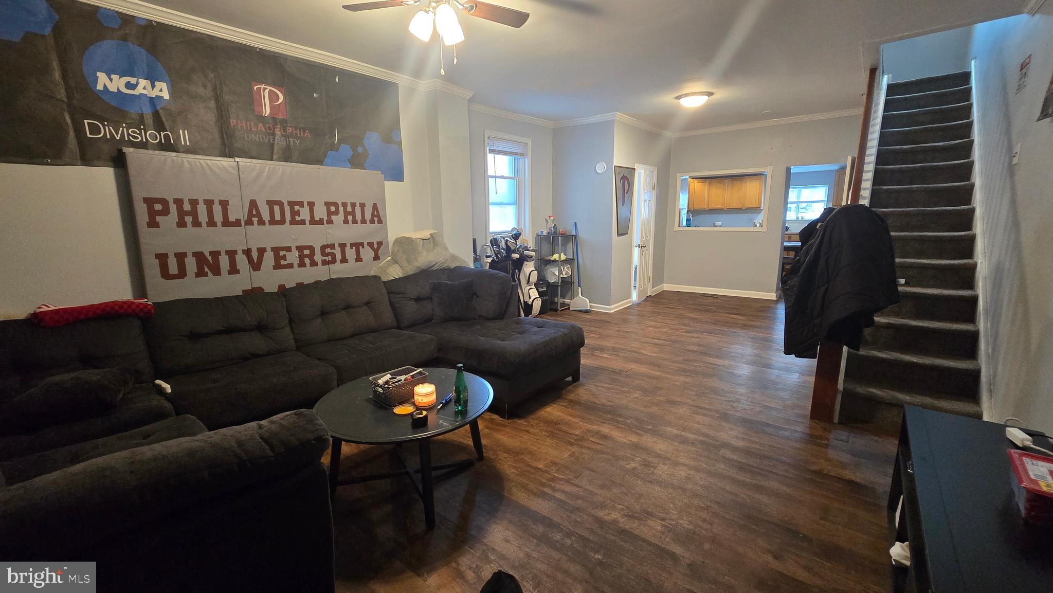 4709 Fowler Street Philadelphia, PA 19127 - Photo 3 of 21 a living room with furniture and a flat screen tv