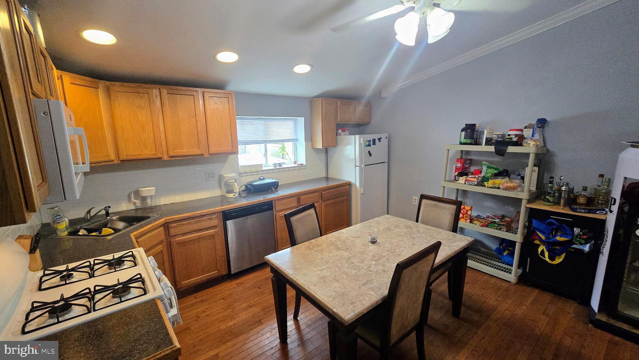 4709 Fowler Street Philadelphia, PA 19127 - Photo 6 of 21 a view of a dining room with furniture and a window