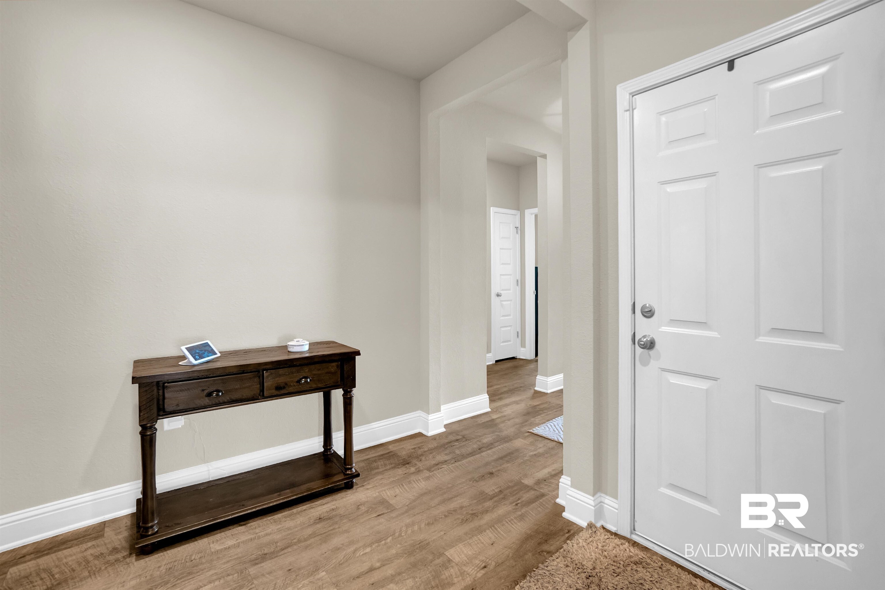 31671 Memphis Loop Daphne, AL 36527 - Photo 13 of 51 Foyer entrance featuring baseboards and wood finished floors