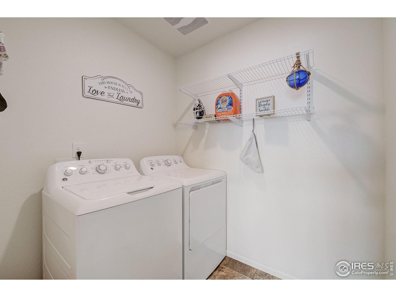 327 Central Avenue Severance, CO 80550 - Photo 17 of 40 a utility room with dryer and washer