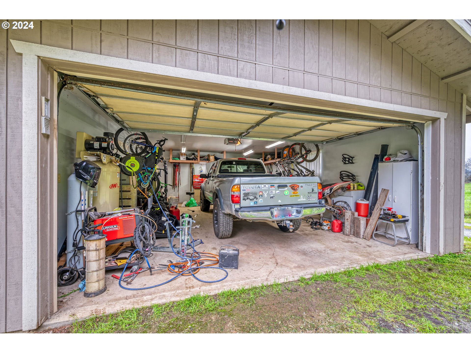 1032 Weaver Road Myrtle Creek, OR 97457 - Photo 26 of 42 a view of a storage room with a lot of stuff
