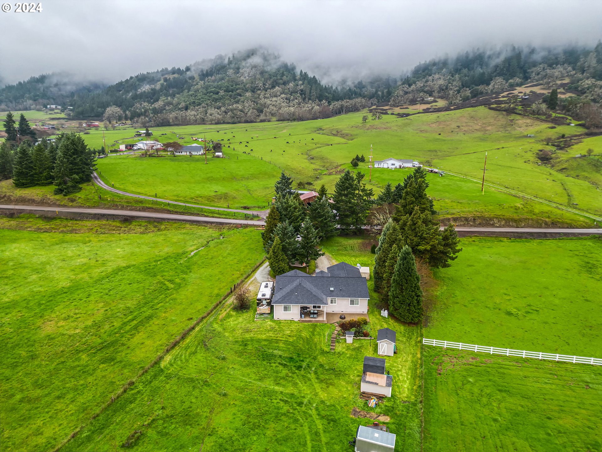 1032 Weaver Road Myrtle Creek, OR 97457 - Photo 41 of 42 an aerial view of a houses with a yard