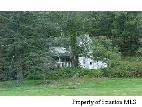 Marshall Squire Road Nicholson, PA 18446 - Photo 6 of 6 a view of a house with a yard