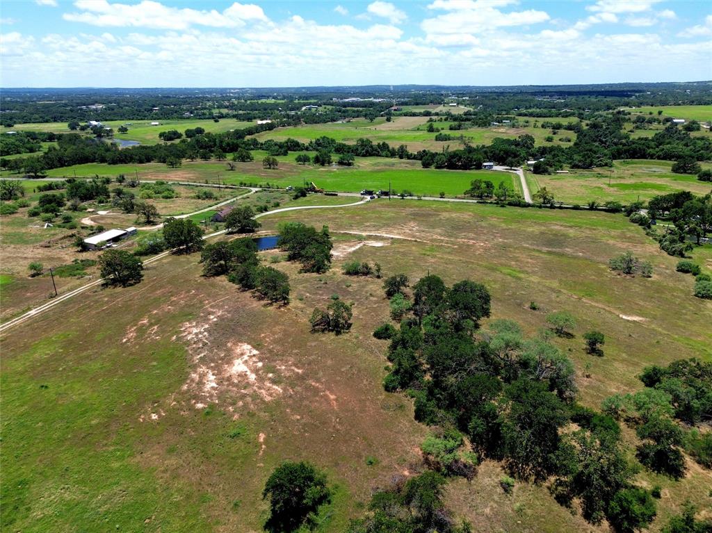 2186 Gilliland Road Springtown, TX 76082 - Photo 8 of 25 Expansive rural landscape featuring extensive green pastures and scattered mature trees