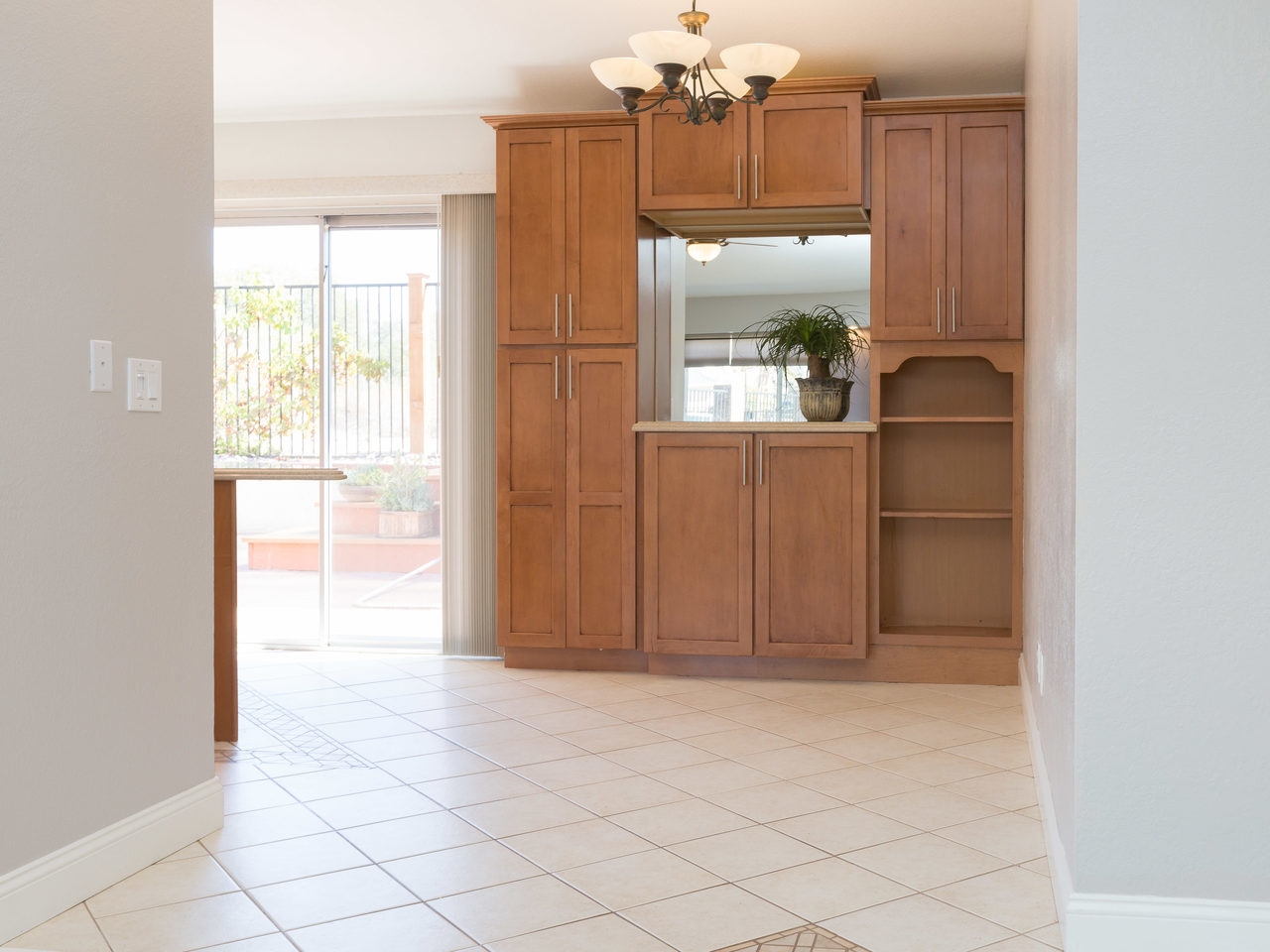 761 Hollowglen Road Oceanside, CA 92057 - Photo 12 of 24 Dining room with custom Maple cabinetry.