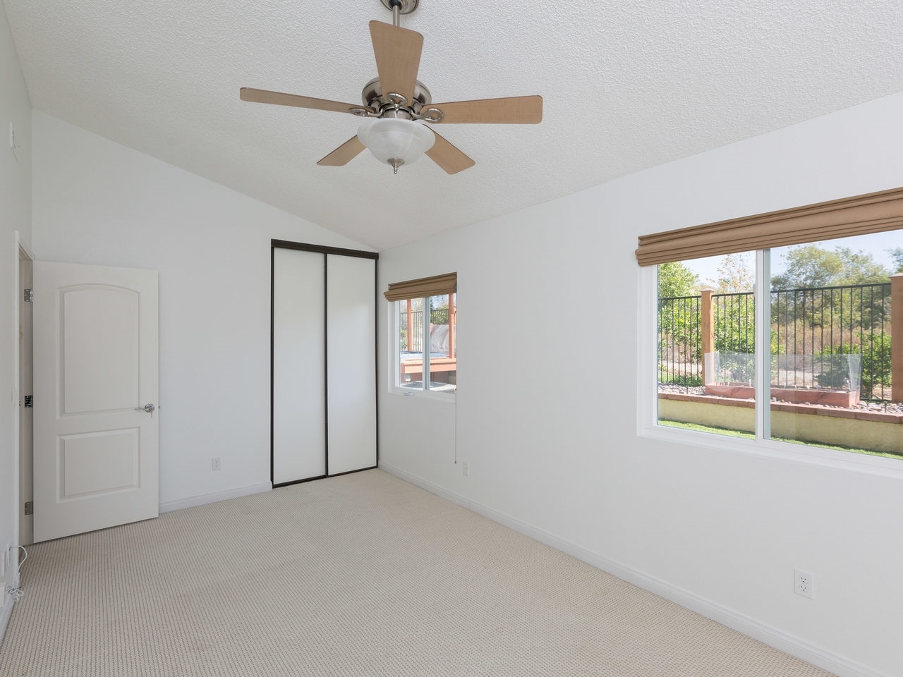 761 Hollowglen Road Oceanside, CA 92057 - Photo 16 of 24 Super large and sunny bedroom with 2 closets that was formerly 2 bedrooms. Easily converted back to to bedrooms with addition of dividing wall.