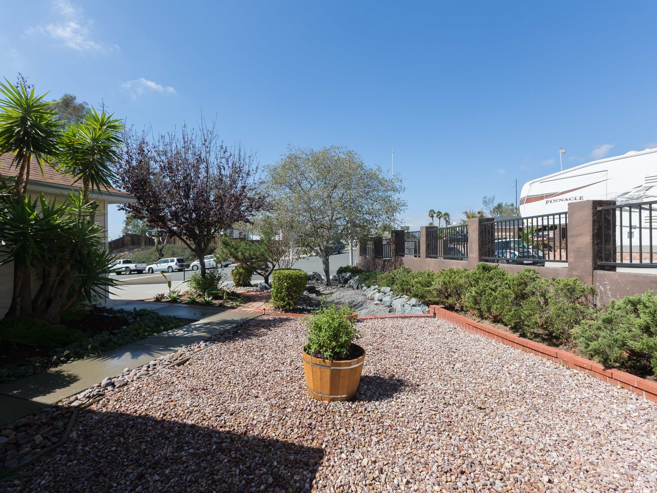 761 Hollowglen Road Oceanside, CA 92057 - Photo 3 of 24 Low maintenance and private front yard.