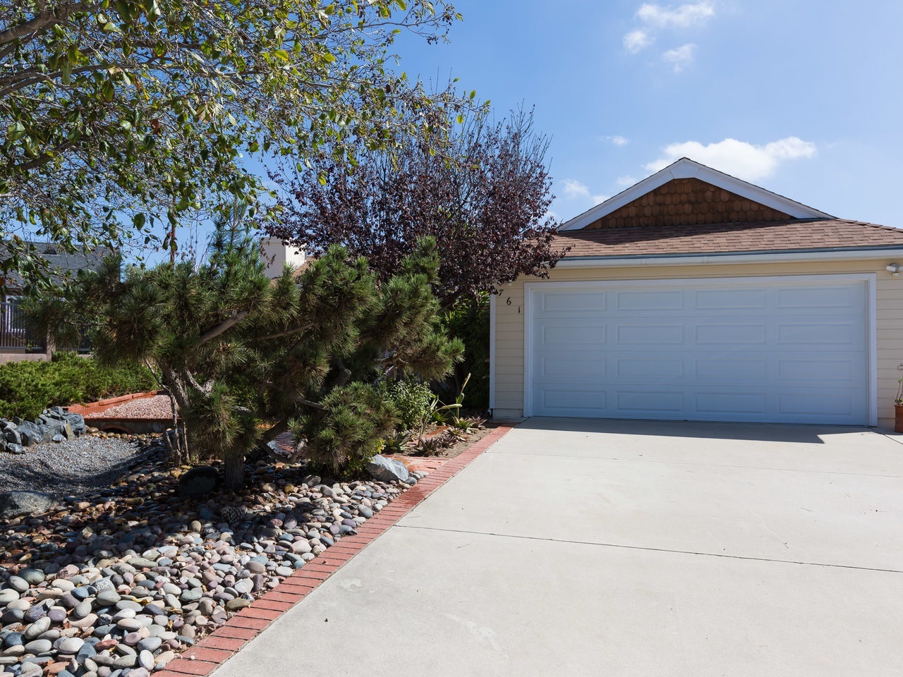 761 Hollowglen Road Oceanside, CA 92057 - Photo 4 of 24 Heated/Cooled garage perfect for workshop or mancave. Extra large drive will accommodate 6 cars or cars and an RV.