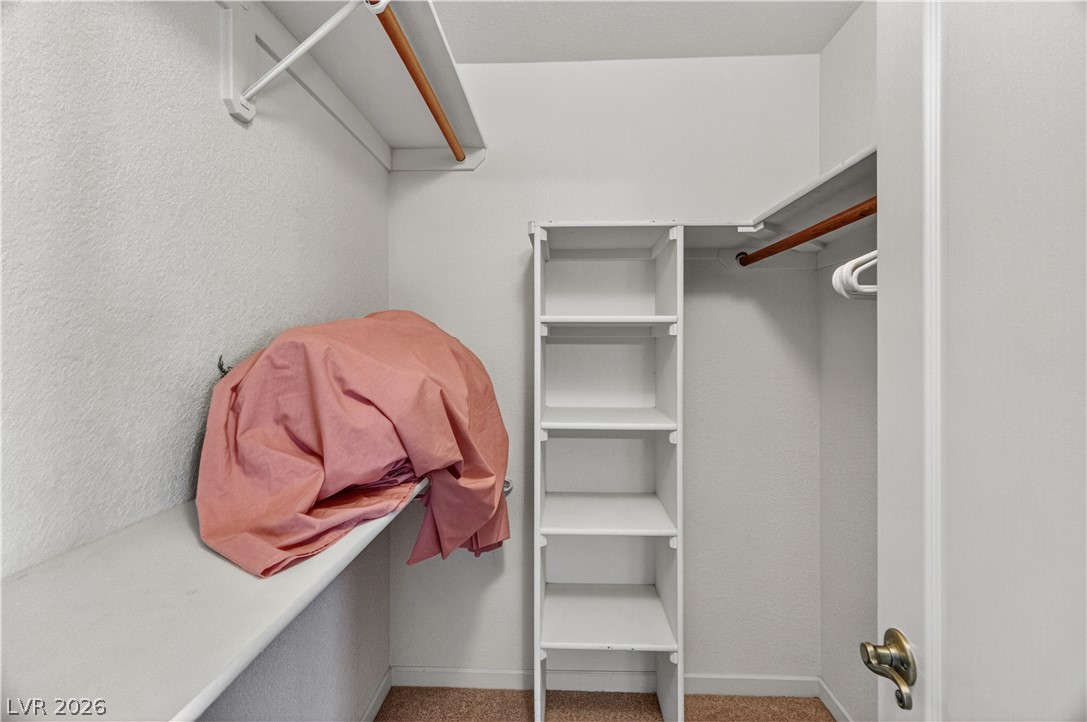 2055 Cholla Way Laughlin, NV 89029 - Photo 32 of 87 Functional walk-in closet featuring integrated shelving and ample hanging space.
