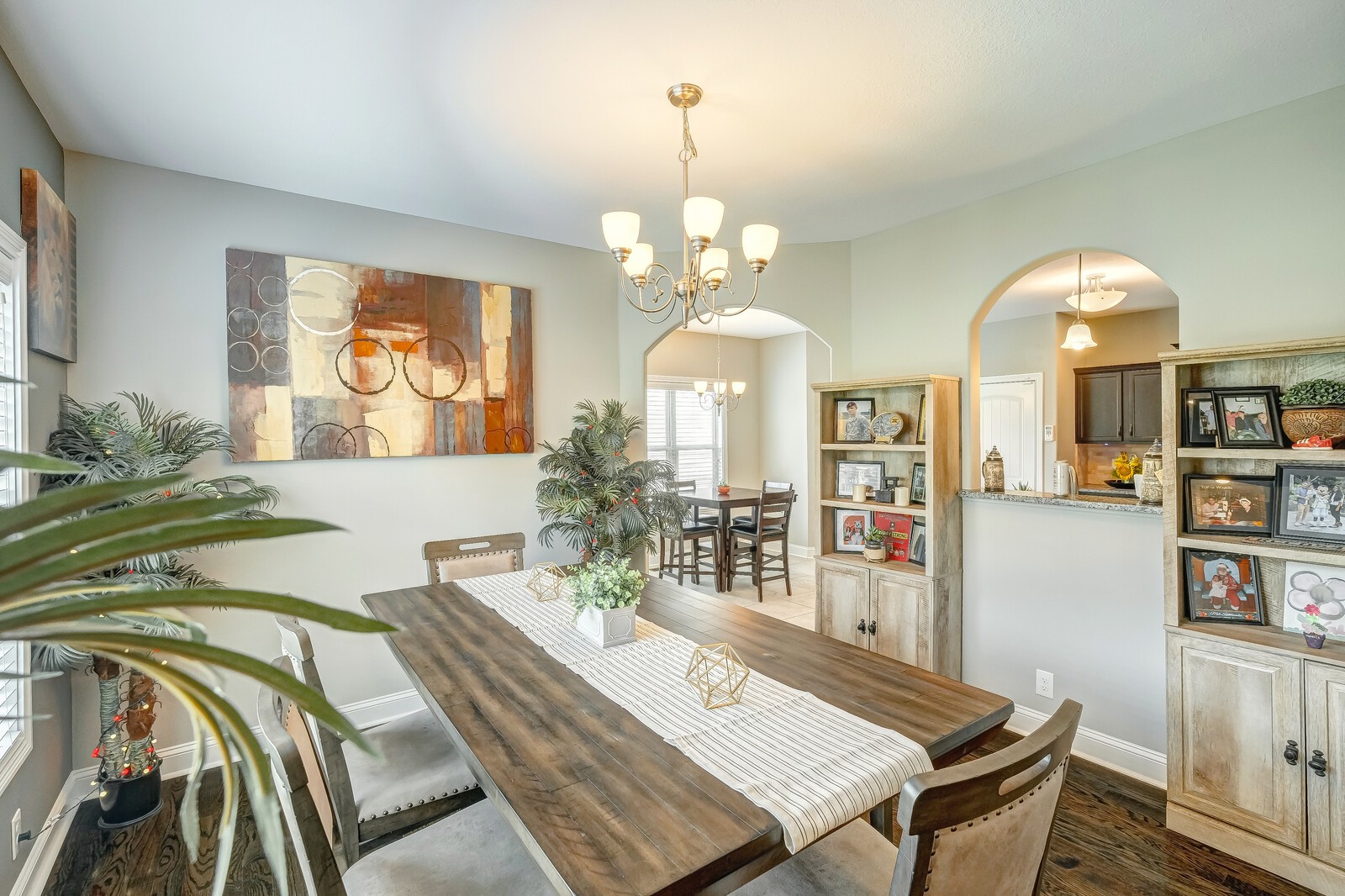 1487 Raven Road Clarksville, TN 37042 - Photo 12 of 44 a view of a dining room with furniture and a chandelier