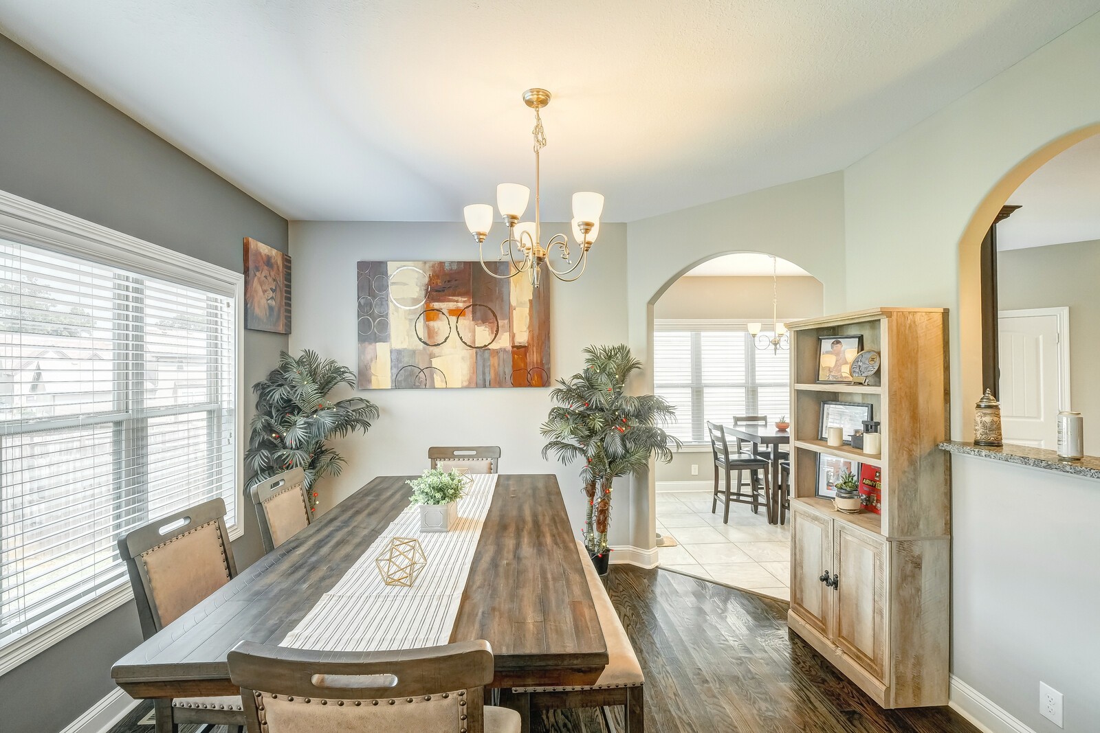1487 Raven Road Clarksville, TN 37042 - Photo 13 of 44 a living room with furniture a chandelier and a large window