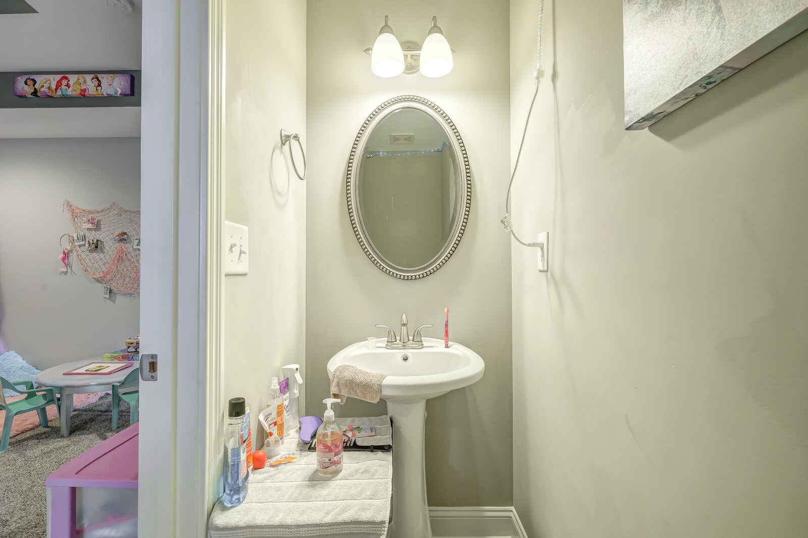 1487 Raven Road Clarksville, TN 37042 - Photo 25 of 44 a bathroom with a sink and a mirror