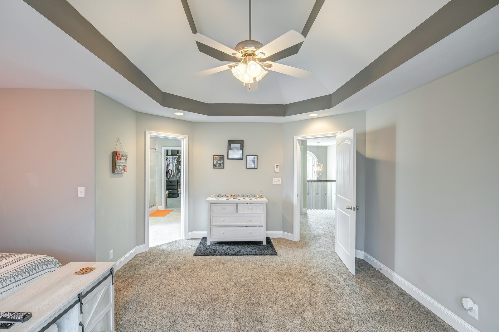 1487 Raven Road Clarksville, TN 37042 - Photo 28 of 44 a bedroom with a bed and a chandelier