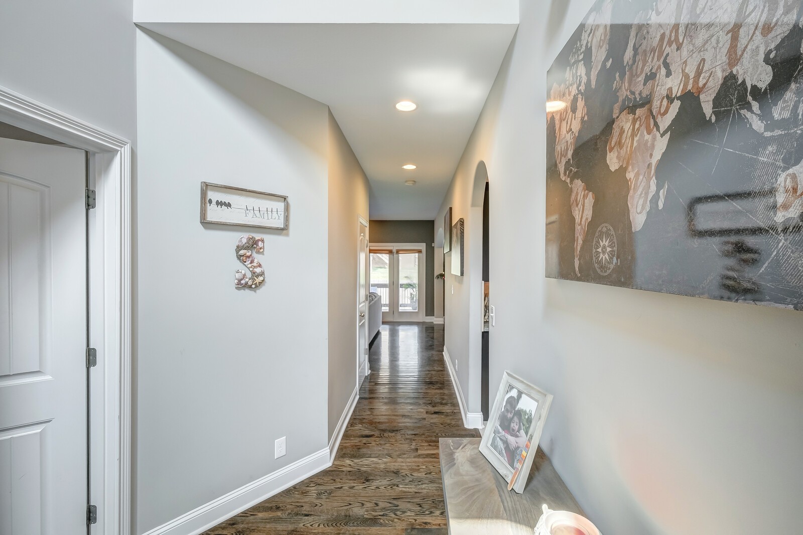 1487 Raven Road Clarksville, TN 37042 - Photo 4 of 44 a view of a hallway with wooden floor