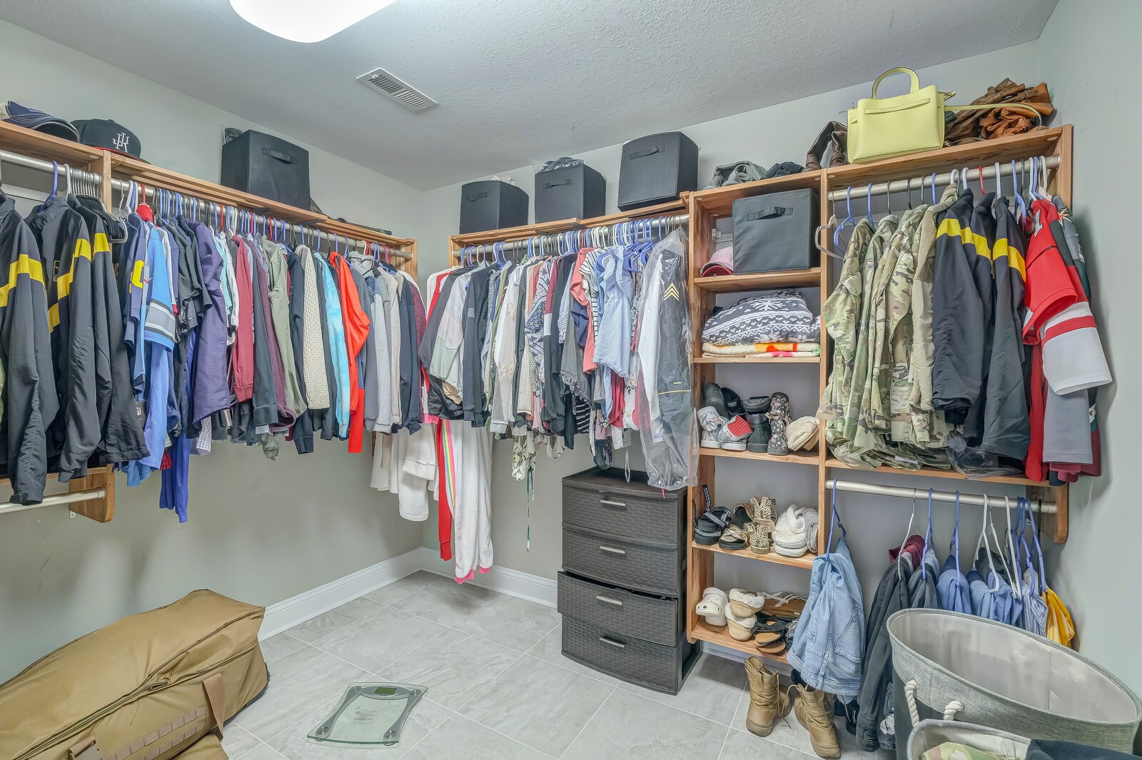 1487 Raven Road Clarksville, TN 37042 - Photo 32 of 44 a view of walk in closet with clothes