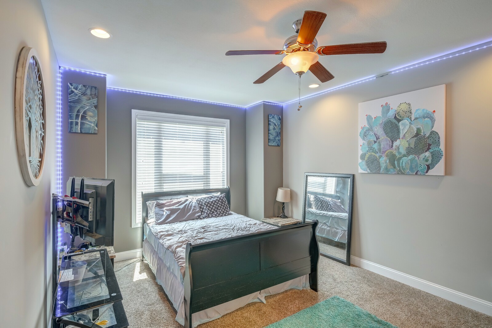 1487 Raven Road Clarksville, TN 37042 - Photo 5 of 44 a bedroom with a bed and a chandelier