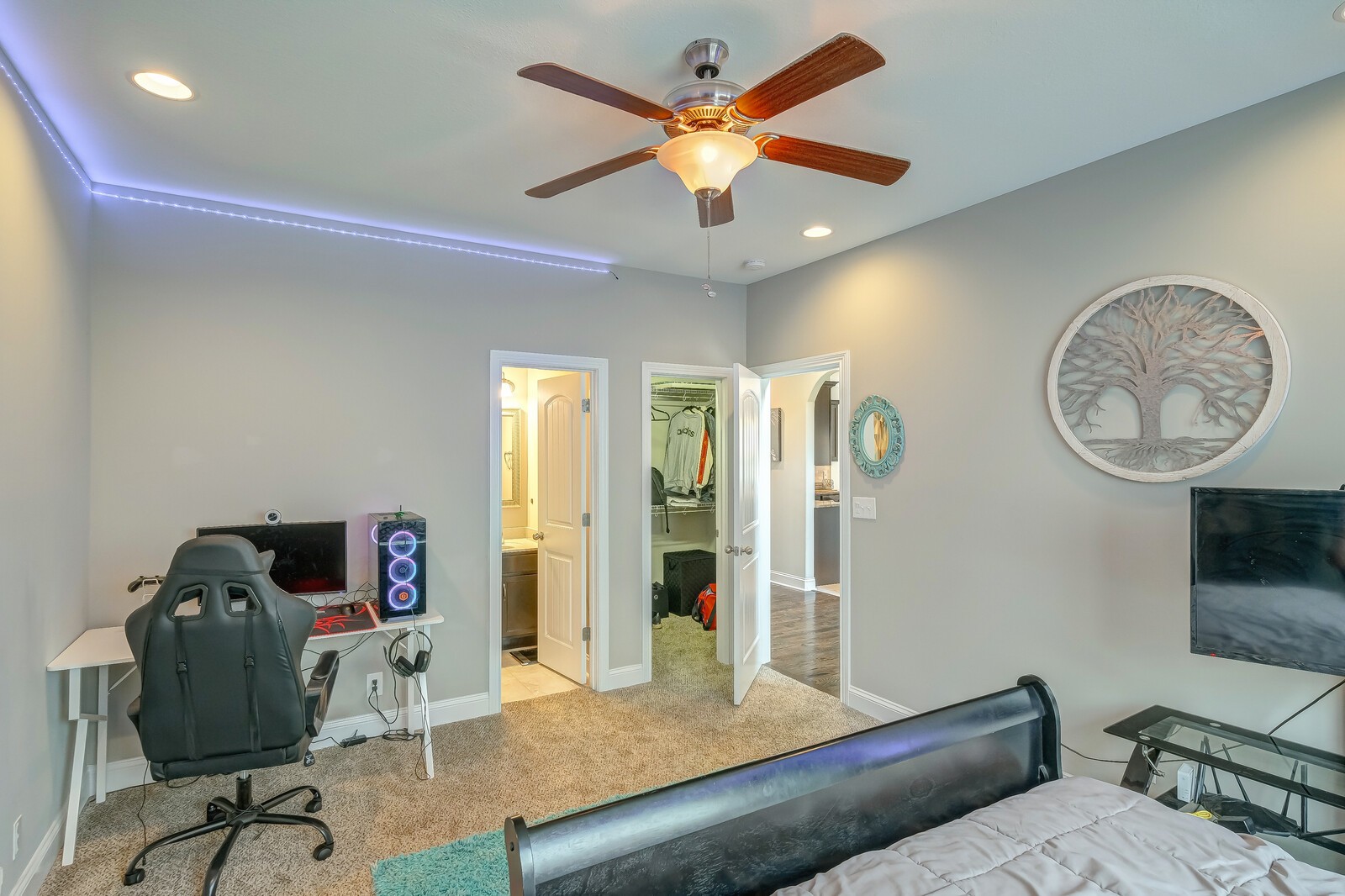 1487 Raven Road Clarksville, TN 37042 - Photo 6 of 44 a living room with furniture a chandelier fan and a window