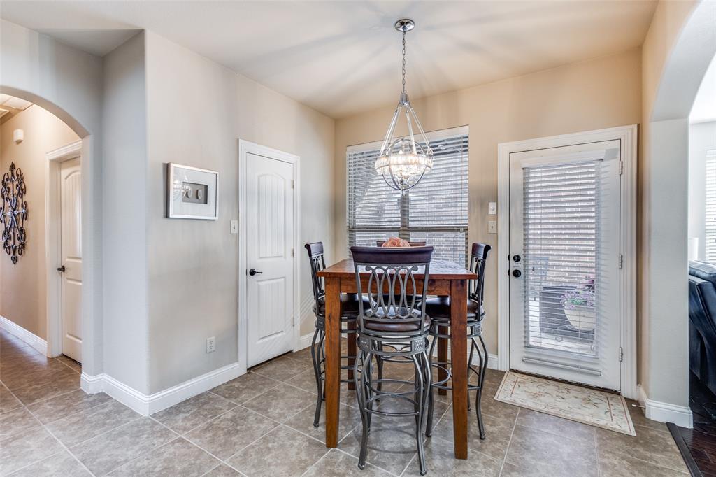 817 Deer Ridge Trail McKinney, TX 75072 - Photo 9 of 35 Eating area with pantry and door to side patio