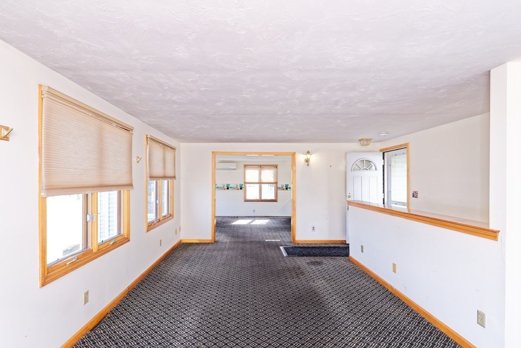 22 Union Avenue Wareham, MA 02571 - Photo 3 of 27 a view of an empty room with a window