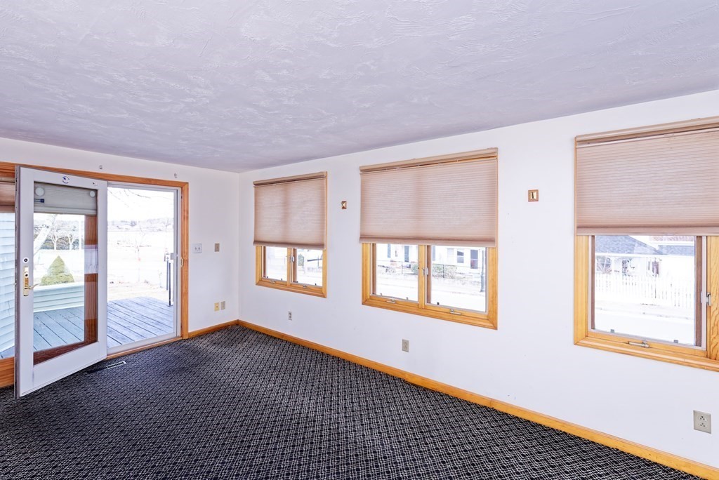 22 Union Avenue Wareham, MA 02571 - Photo 4 of 27 a view of an empty room with a window