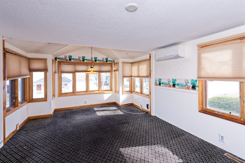 22 Union Avenue Wareham, MA 02571 - Photo 10 of 27 a living room with a large window