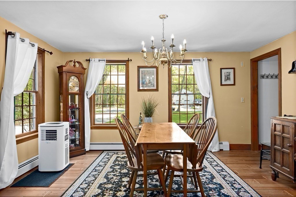 41 Baker Road Salisbury, MA 01952 - Photo 13 of 29 a view of a dining room with furniture window and wooden floor