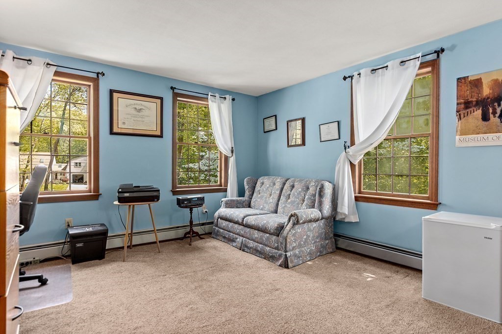 41 Baker Road Salisbury, MA 01952 - Photo 21 of 29 a living room with furniture and a window