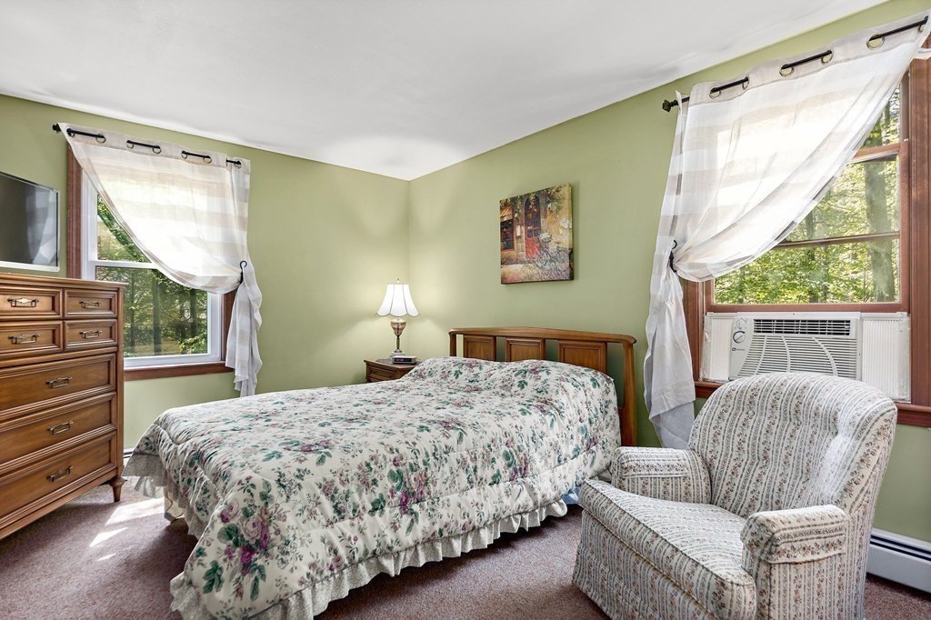 41 Baker Road Salisbury, MA 01952 - Photo 23 of 29 a bedroom with two beds and a large window with the outer view