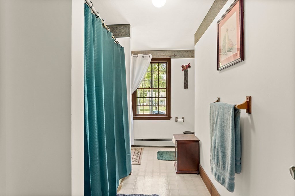 41 Baker Road Salisbury, MA 01952 - Photo 24 of 29 a bathroom with a bathtub and a shower