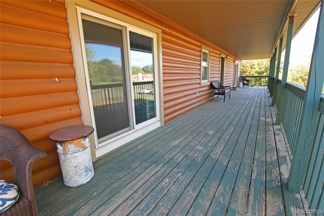 3818 Mels Road Metamora, MI 48455 - Photo 18 of 53 18) Front Porch.jpg