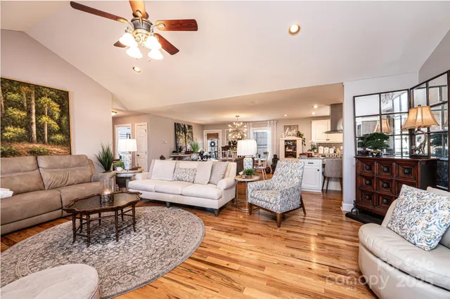 a living room with furniture or outdoor view and a chandelier
