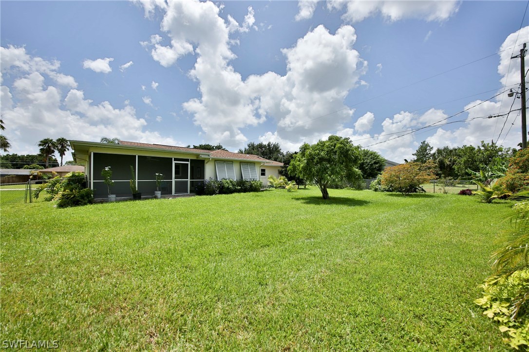 17520 Lebanon Road Fort Myers, FL 33967 - Photo 15 of 15 a view of a house with backyard and garden